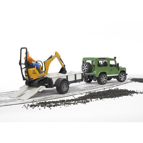 Land Rover Defender with trailer, JCB excavator and man
