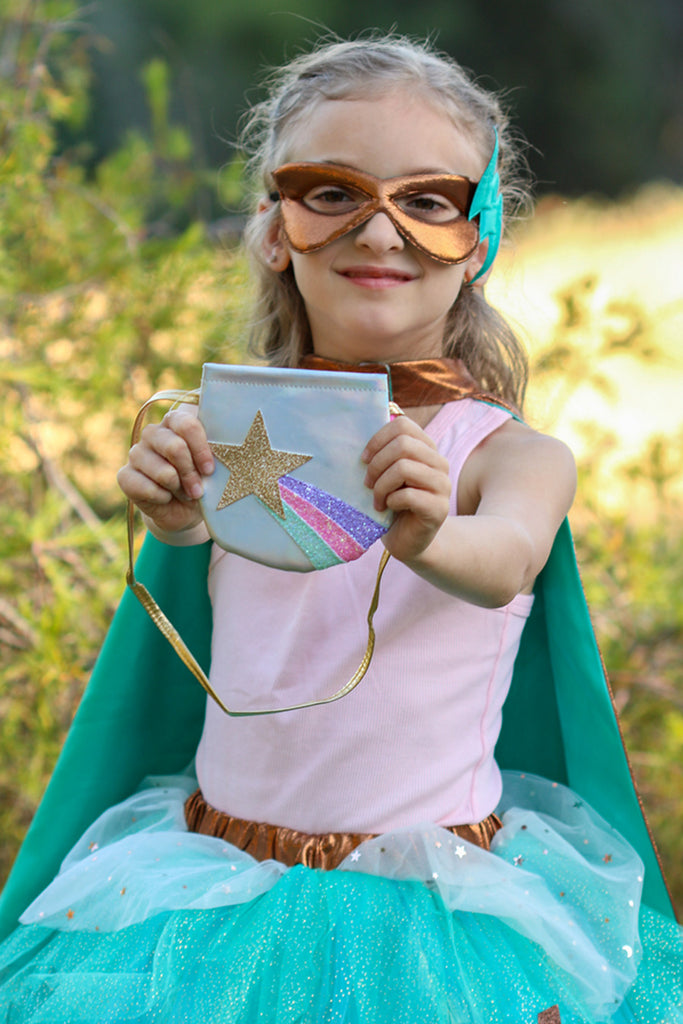 Shining Star petite silver purse with colorful shooting star design, golden shoulder strap with tassel and Velcro closure