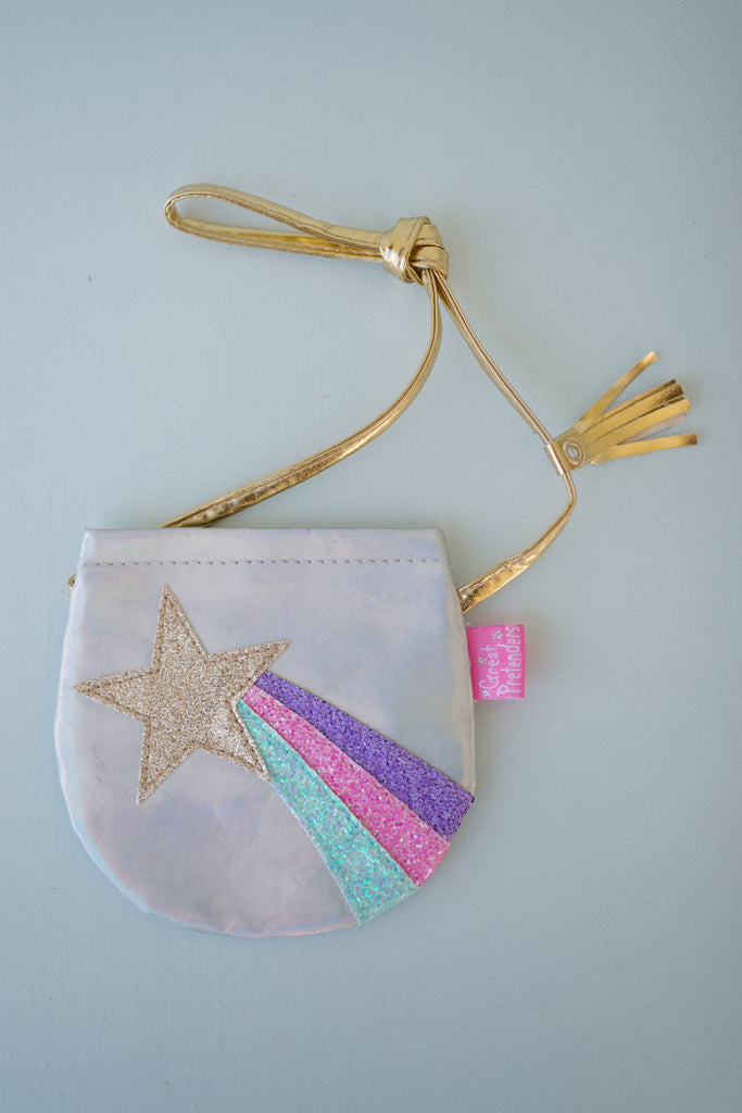 Shining Star petite silver purse with colorful shooting star design, golden shoulder strap with tassel and Velcro closure
