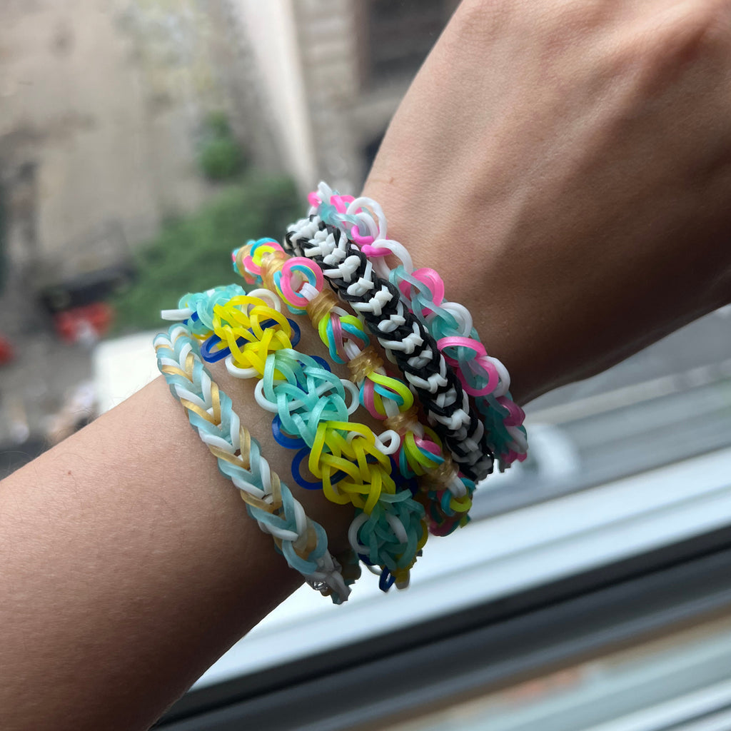 Rainbow Loom Mega Combo with loom board, colorful rubber bands, and hook tool for bracelet making