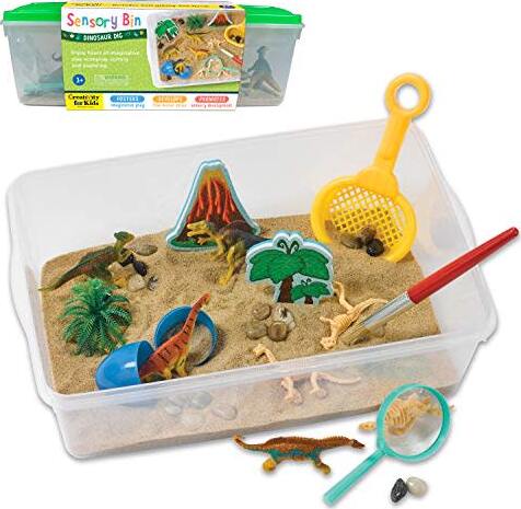 Creativity for Kids Sensory Bin Dinosaur Dig with kinetic sand, dinosaur fossils, and excavation tools