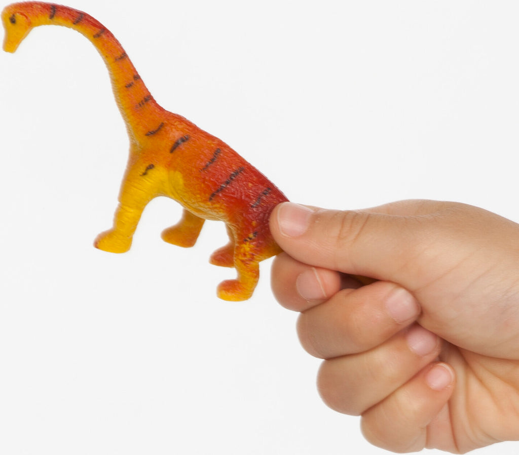 Creativity for Kids Sensory Bin Dinosaur Dig with kinetic sand, dinosaur fossils, and excavation tools