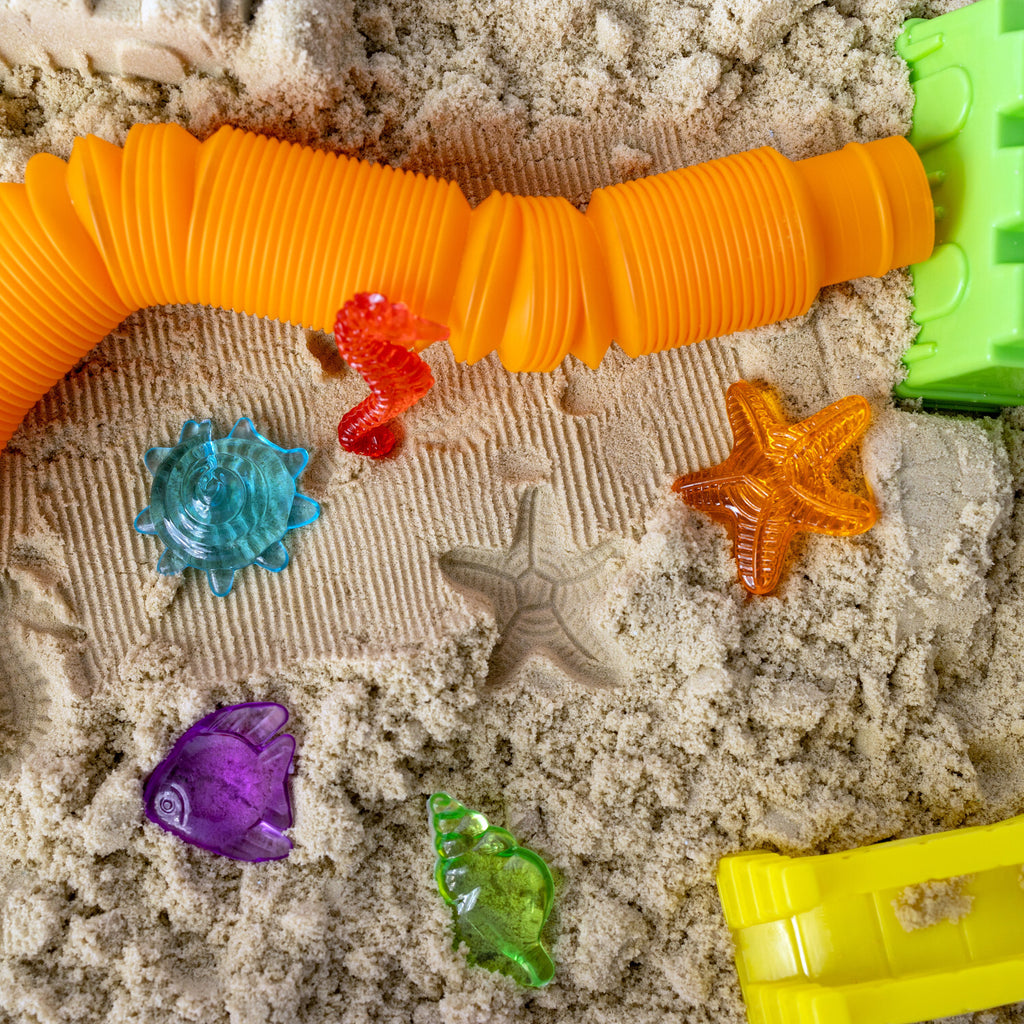 Creativity for Kids Sensory Bin Beach with kinetic sand, beach toys, shells, and summer accessories
