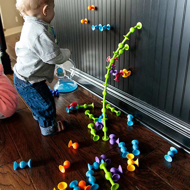 Colorful Squigz Deluxe Set silicone suction toys in various shapes for creative building and sensory play