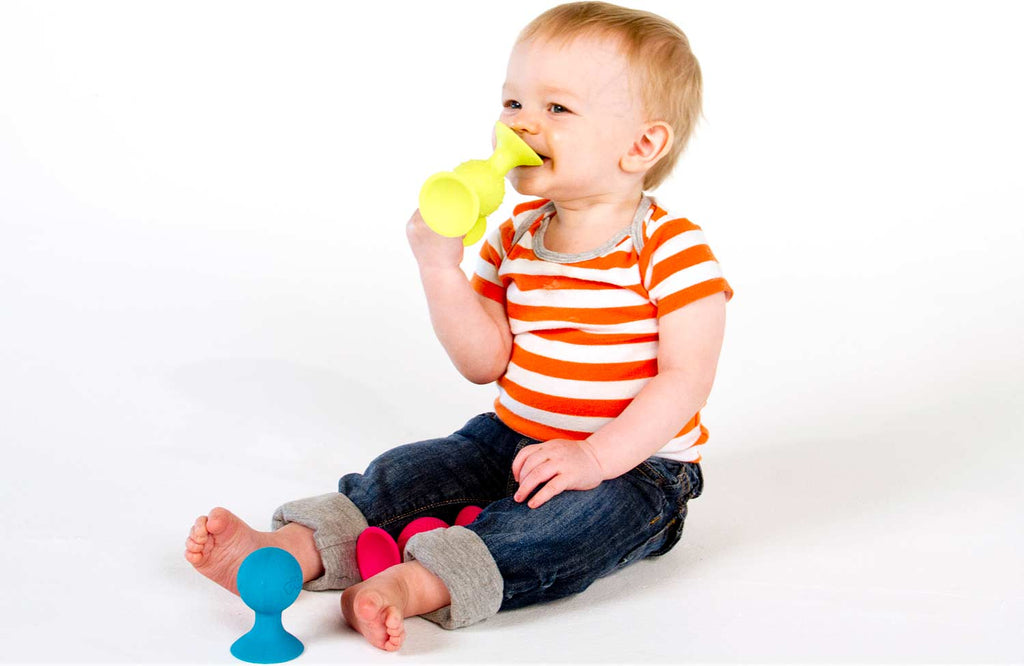 Fat Brain Toys pipSquigz suction cup building set with colorful pieces for creative construction play