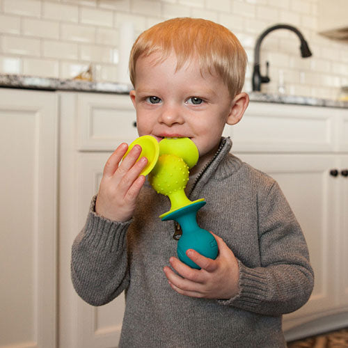 Fat Brain Toys pipSquigz suction cup building set with colorful pieces for creative construction play