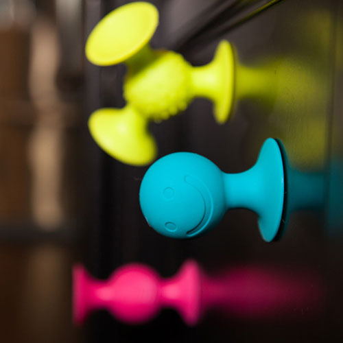 Fat Brain Toys pipSquigz suction cup building set with colorful pieces for creative construction play