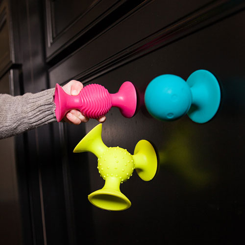 Fat Brain Toys pipSquigz suction cup building set with colorful pieces for creative construction play