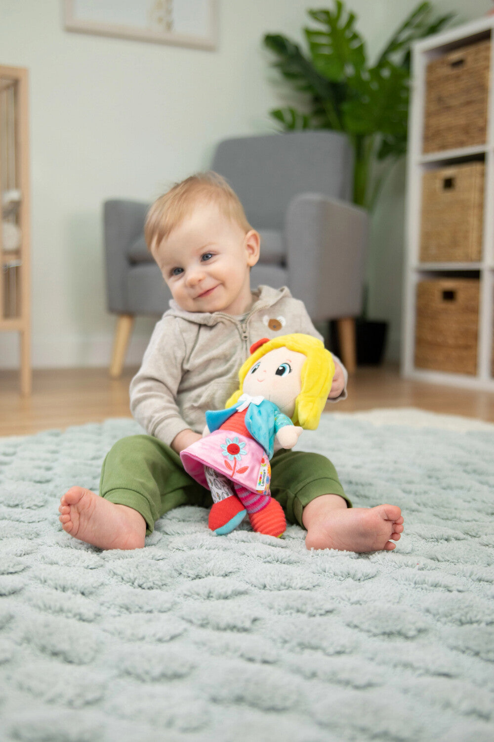 Lamaze My Friend Olivia plush sensory doll with crinkly textures and clip attachment for babies