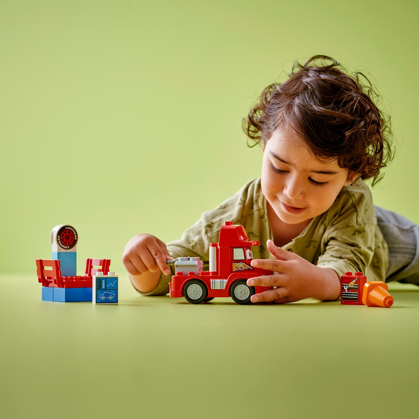 LEGO DUPLO Disney and Pixar’s Cars Mack at the Race red truck toy for toddlers