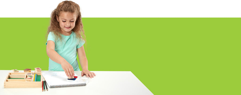 Wooden Stamp Set Dinosaurs with prehistoric creature designs and ink pad for creative stamping activities