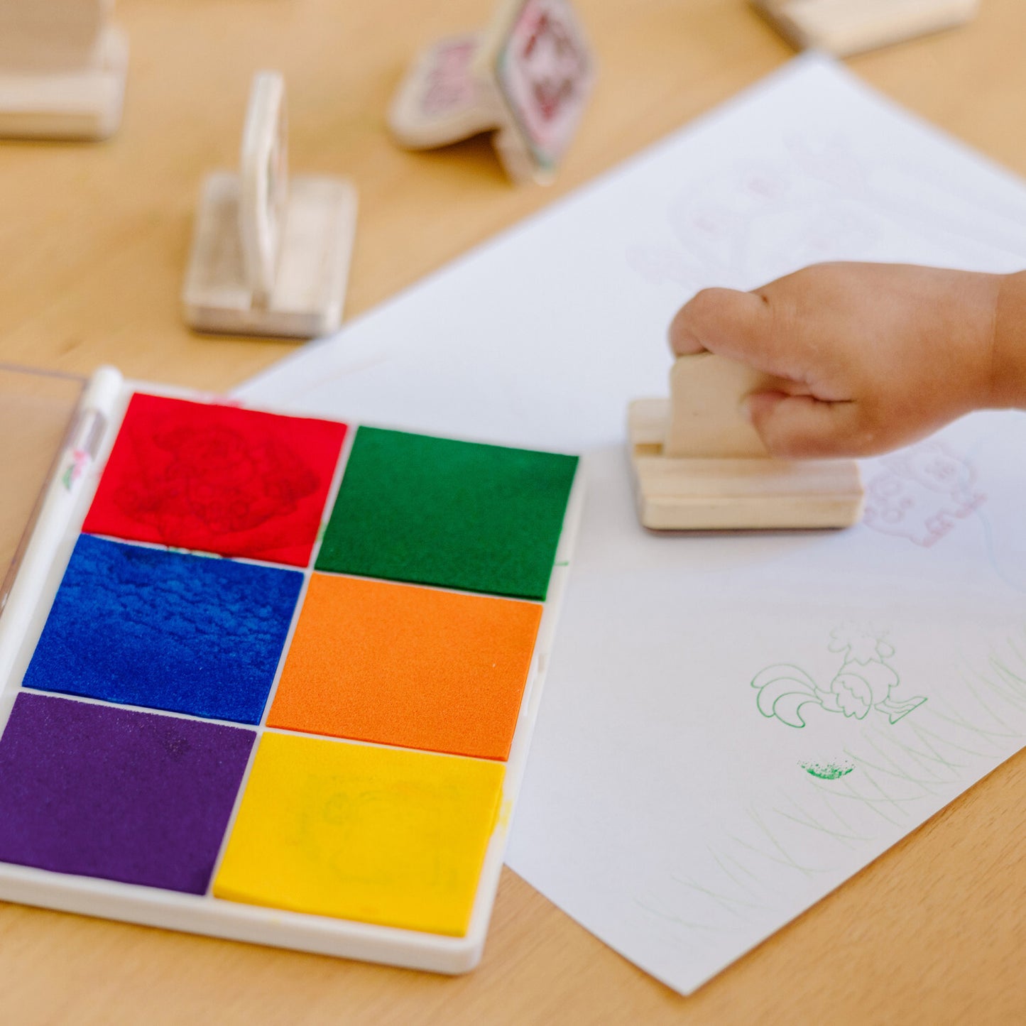 Rainbow Stamp Pad with multiple vibrant colors for creative stamping projects and colorful artwork