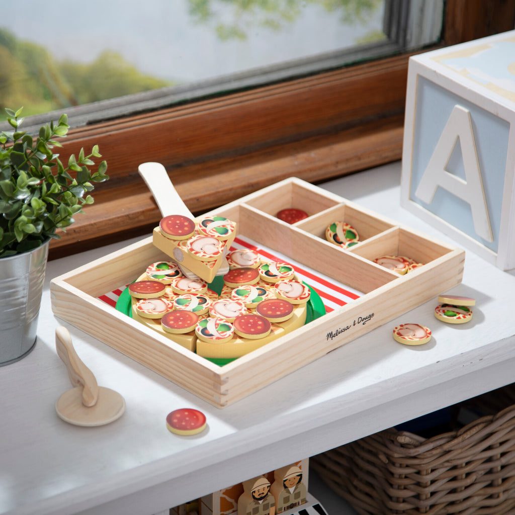 Pizza Party wooden play food set with 54 toppings, pizza cutter, and spatula for pretend play