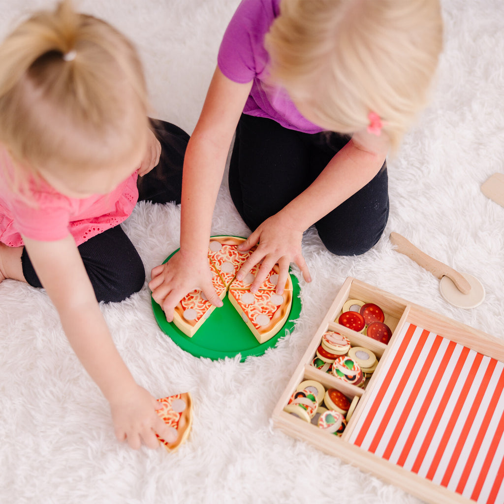 Pizza Party wooden play food set with 54 toppings, pizza cutter, and spatula for pretend play