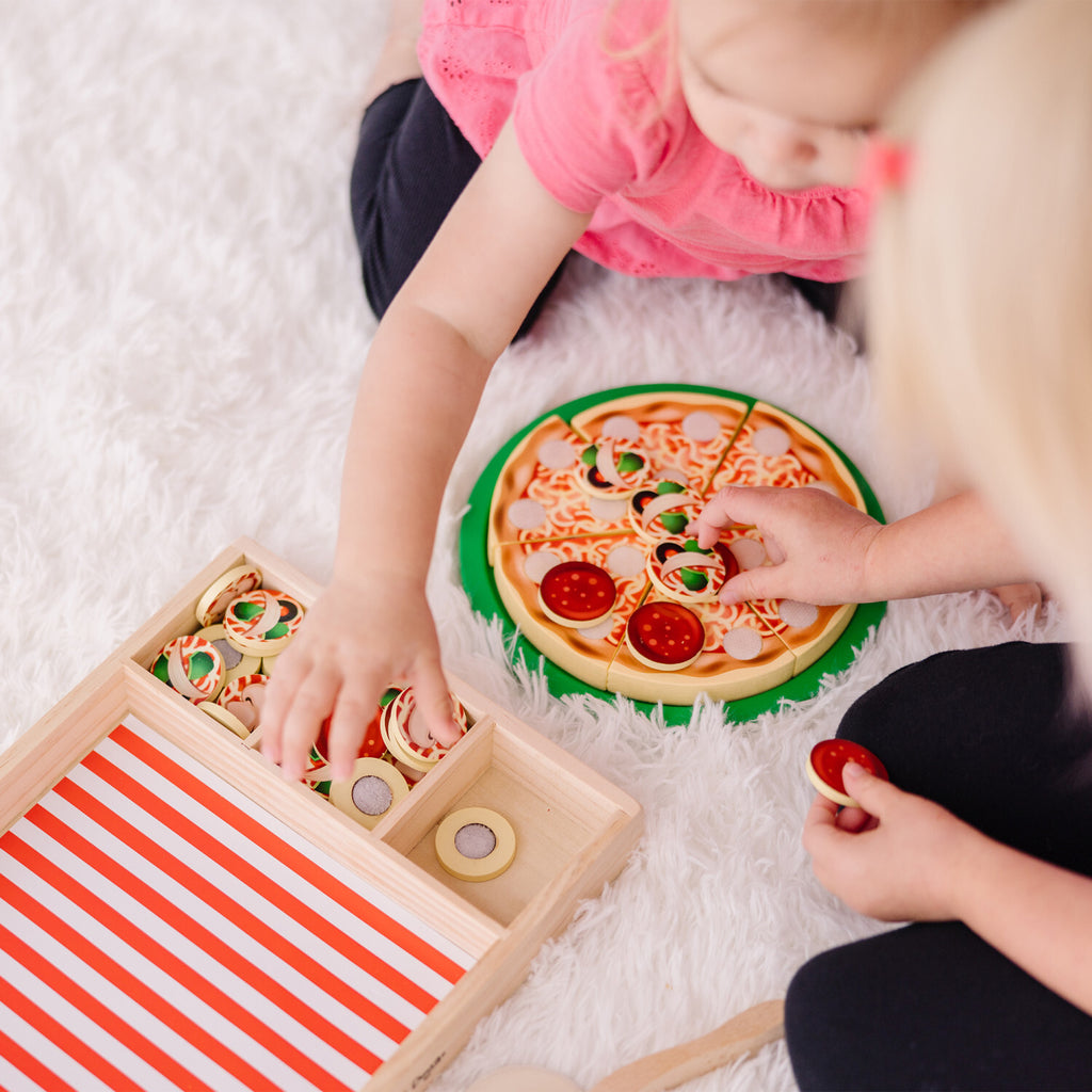 Pizza Party wooden play food set with 54 toppings, pizza cutter, and spatula for pretend play