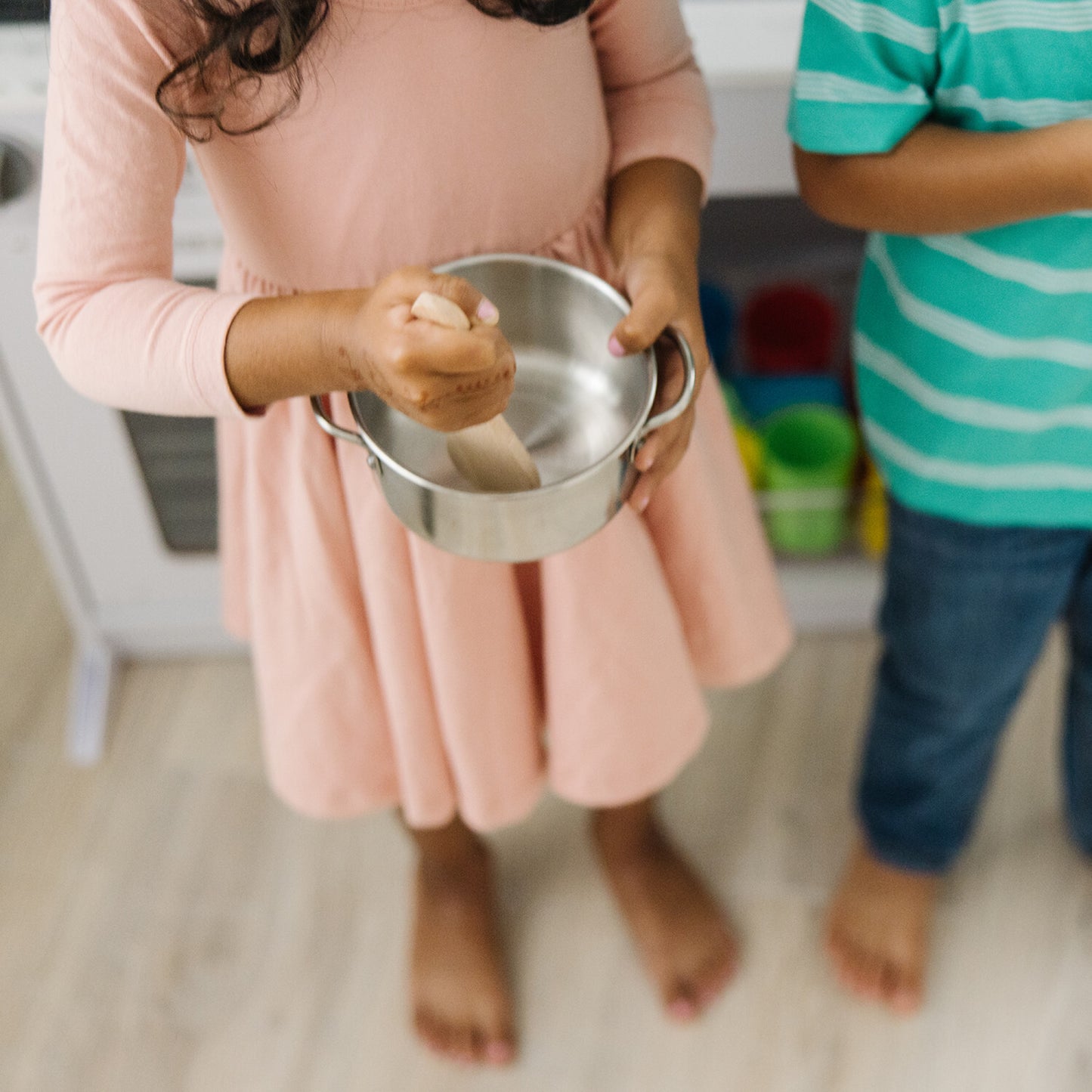 Let's Play House! Stainless Steel Pots & Pans Play Set with colander, three pans, storage rack and wooden utensils by Melissa & Doug