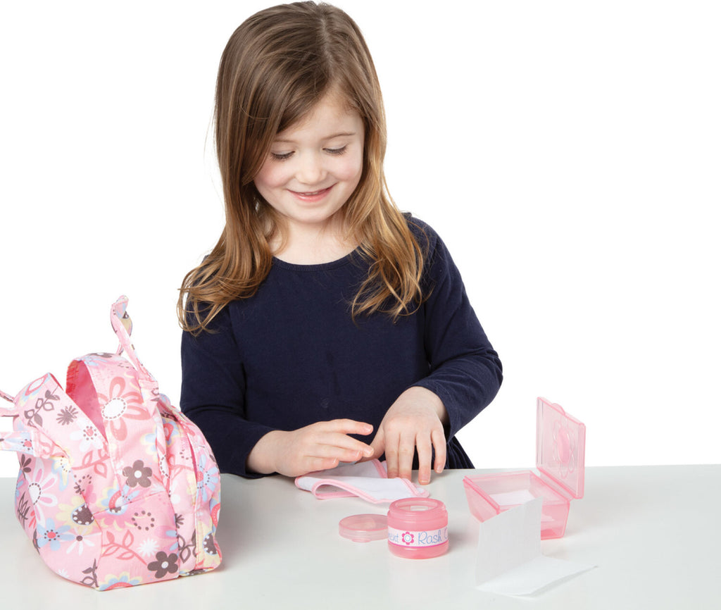 Melissa & Doug Mine to Love diaper bag set with doll care accessories and realistic baby items