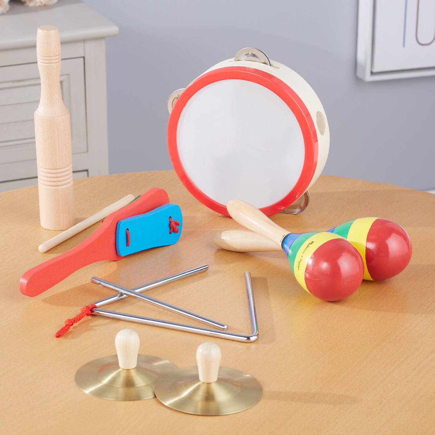 Band-in-a-Box musical instrument set with tambourine, cymbals, maracas, clacker, tone blocks and triangle for preschoolers
