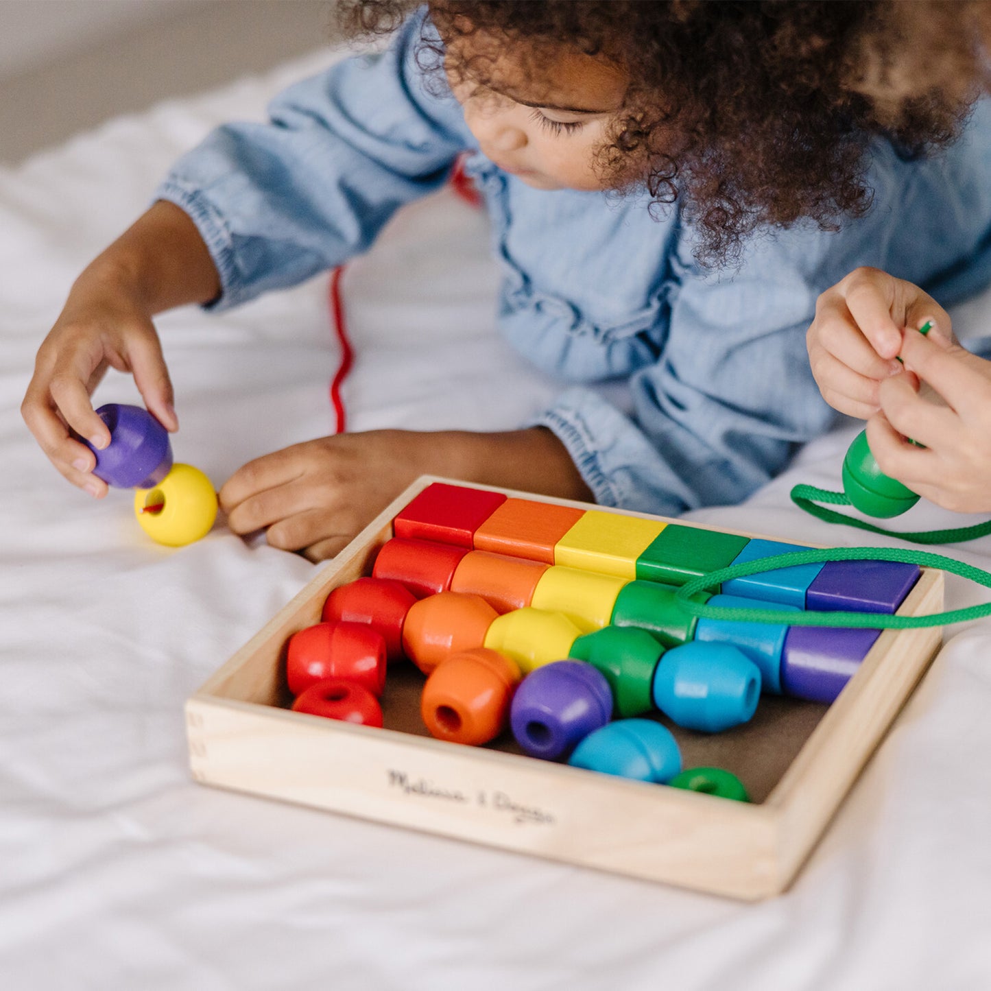 Primary Lacing Beads set with colorful wooden beads and laces for fine motor development