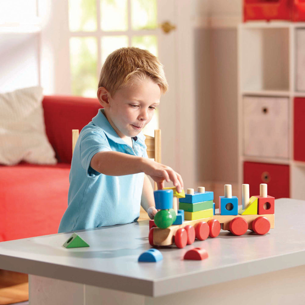 Stacking Train Toddler Toy with 15 colorful stacking pieces on pegged wooden train cars over 17 inches long
