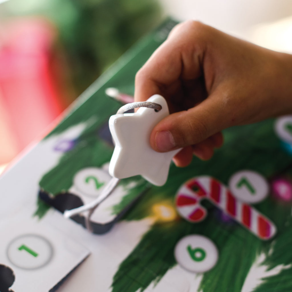 12 Days of Color Your Own Ornaments advent calendar with 12 porcelain ornaments, markers and 3D countdown calendar