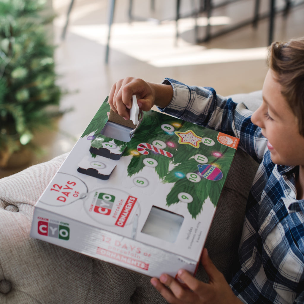 12 Days of Color Your Own Ornaments advent calendar with 12 porcelain ornaments, markers and 3D countdown calendar