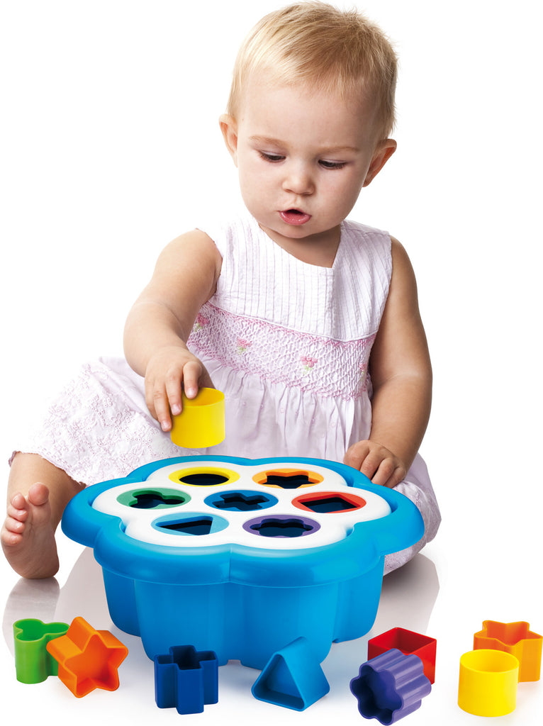 Daisy shape sorter toy with colorful daisy-shaped base, 7 different shaped holes, and 14 matching blocks for toddlers