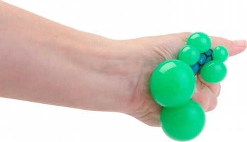 Color changing mesh stress ball with TPR and fabric construction that changes colors when squeezed