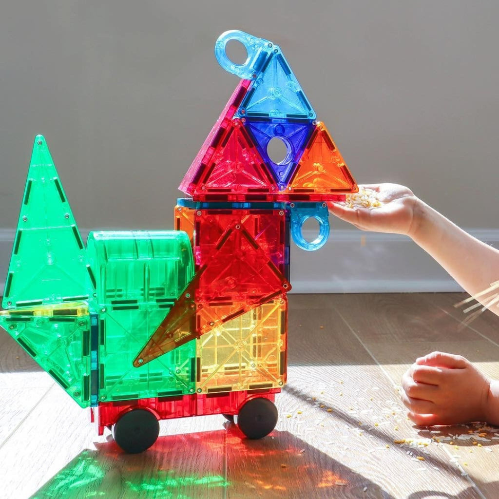 MAGNA-TILES DX 48-Piece Magnetic Construction Set with unique deluxe shapes including arch, hinged door and wheeled chassis