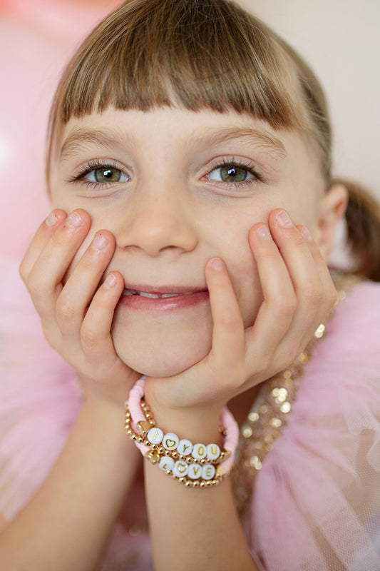 Pink Love Bracelets with romantic pink heart designs for dress-up play