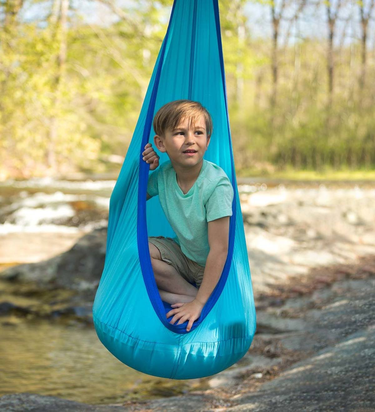 Hugglepod Lite hanging sensory pod swing for children's indoor relaxation and calm space