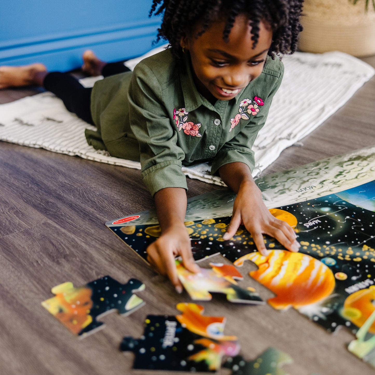 Solar System Floor Puzzle 48 pieces with beautifully illustrated planets and space themed cardboard pieces