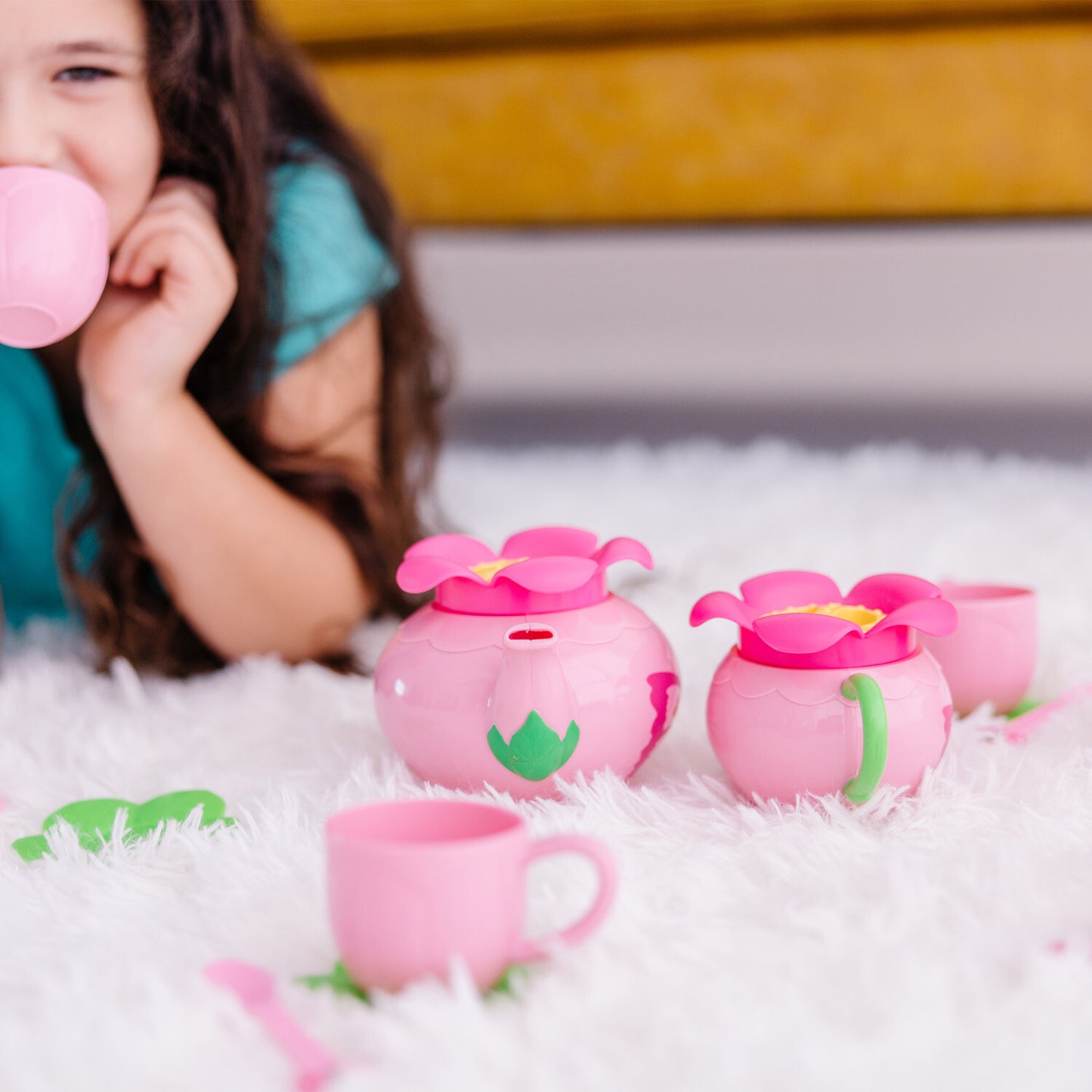 Bella Butterfly Pretend Play Tea Set with 17 pieces in rosy colors and charming butterfly decorations by Melissa & Doug