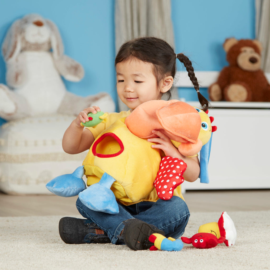 Melissa & Doug Hungry Pelican learning toy with fish that disappear and reappear for cause-effect play