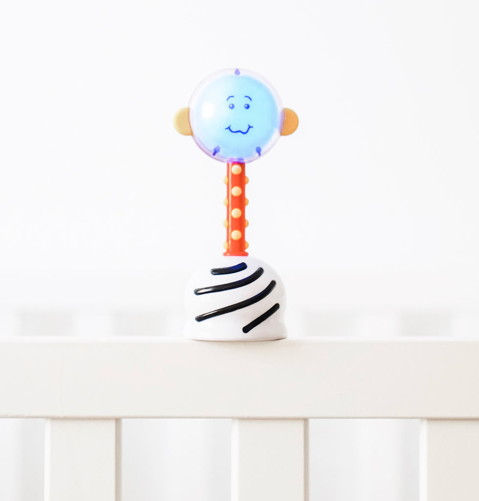 SmartNoggin NogginStik developmental rattle with red, blue, green lights and textures for babies